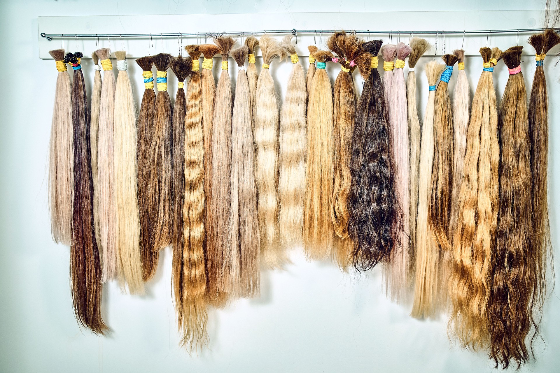 Premium hair extension palette with color samples from blonde to